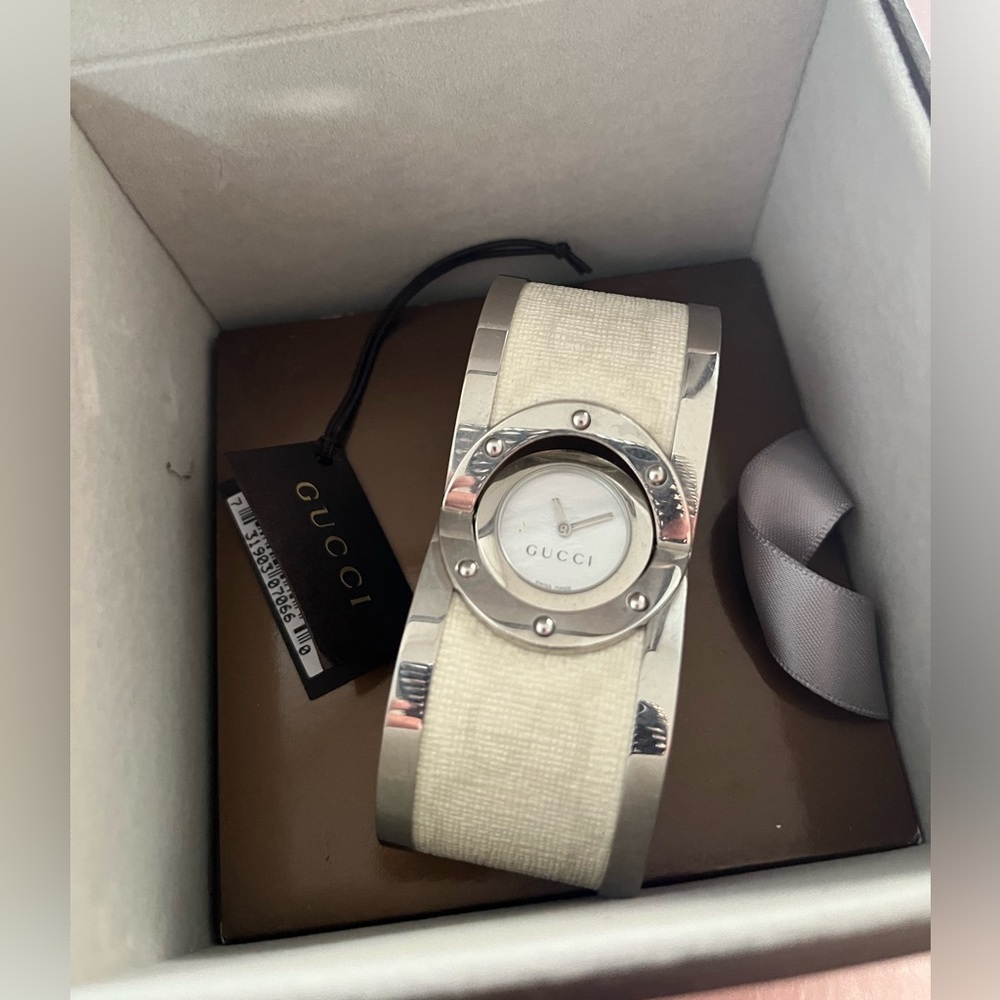 Gucci cuff rotating reversible watch